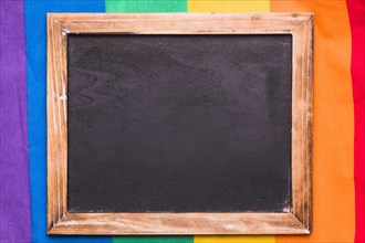 Empty blackboard rainbow background