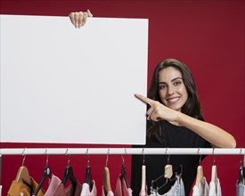 Beautiful woman holding banner mock up