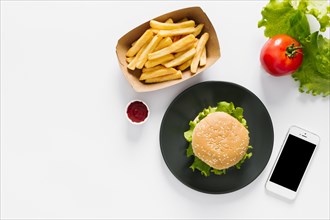 Flat lay burger fries plate with copyspace