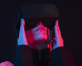 Woman with futuristic device close up