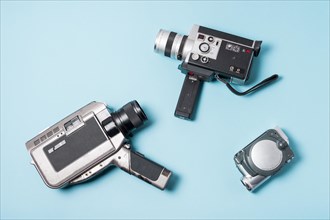 Different type camcorder blue background