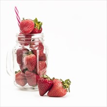 Fresh strawberries jar white background