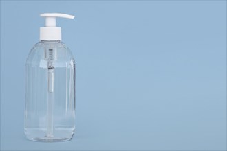 Front view transparent bottle liquid soap with copy space