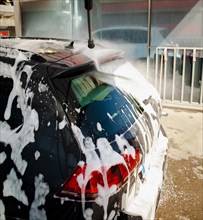 Stick spraying water car