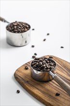 High angle cups with coffee beans