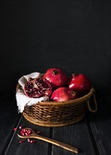 Basket with autumn pomegranates