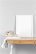Frame mock up table with telephone