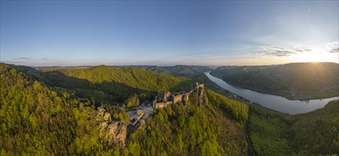 Drone shot of Aggstein Ruin at sunrise with Danube