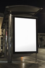 Bus shelter billboard night