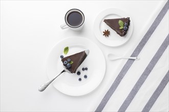 Top view chocolate cake slices plates