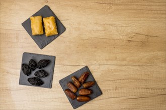 Different dried fruits with eastern sweets