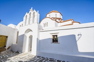 Archway with bells of the Chapel of Agios Antonios and Greek Orthodox Church of Metamorfosi Sotiros