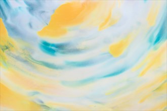 Yellow turquoise ink stain design texture backdrop