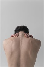 Back view naked man