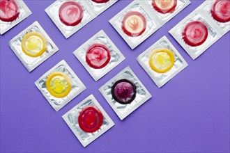 Flat lay arrangement contraception concept purple background
