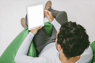 Modern man sofa with tablet
