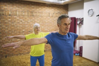 Older couple training gym