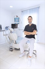 Happy confident dentist clinic