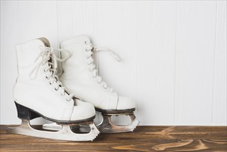 Ice skates wooden tabletop