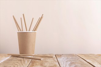 Paper cup holding paper straws