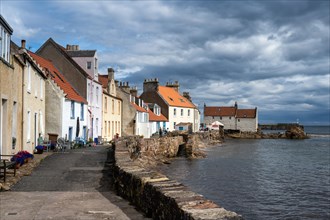 Traditional old dwellings lined up along the Fife Coastal Path in the fishing village of Pittenweem