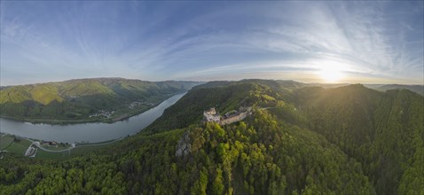 Drone shot of Aggstein Ruin at sunrise with Danube