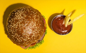 Top view classic beef burger with ketchup
