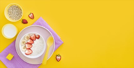 Bowl with cereals fruits with copy space