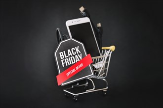 Black friday decoration with smartphone cart label