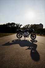 Motorbike sun with shadow