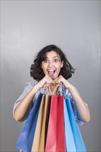 Happy woman with shopping bags
