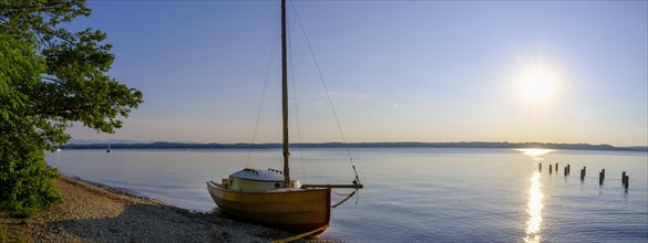 Small sailboat on the shore