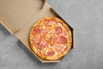 Top view of pizza with ham
