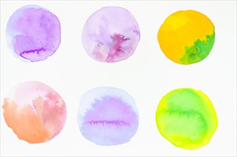 Row hand painted watercolor circles design isolated white