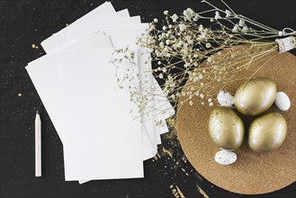 Flowers near eggs paper