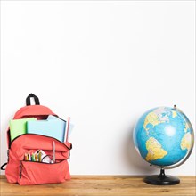 School bag with globe table