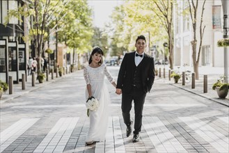 Bride groom walking street