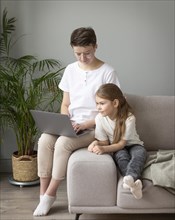 Kid parent looking laptop