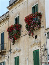 Italian house with balcony and flower boxes
