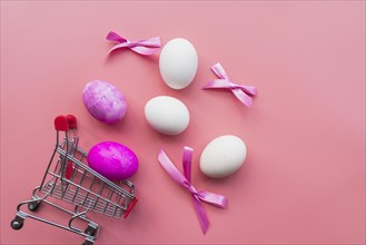 Easter eggs with bows cart
