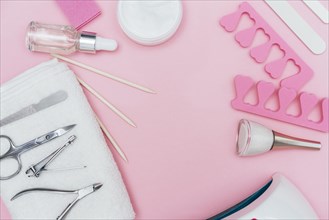 Nail care accessory tools copy space pink background