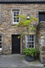 Old stone house in detail in the old town of St Andrews