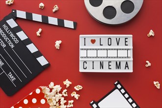 Flat lay cinema elements red background