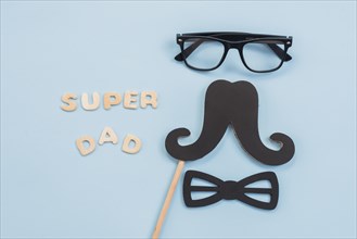 Super dad inscription with glasses mustache