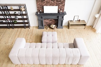High angle minimalist living room with fireplace