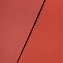 Various shades red paper close up