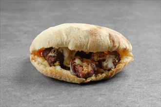 Pita bread with beef or lamb meatballs