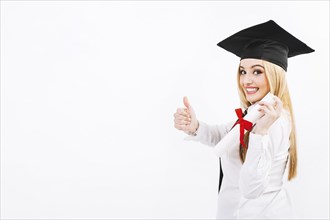 Excited woman with diploma paper white