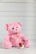 Teddy bear with dummy