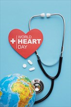 Top view world heart day concept with earth